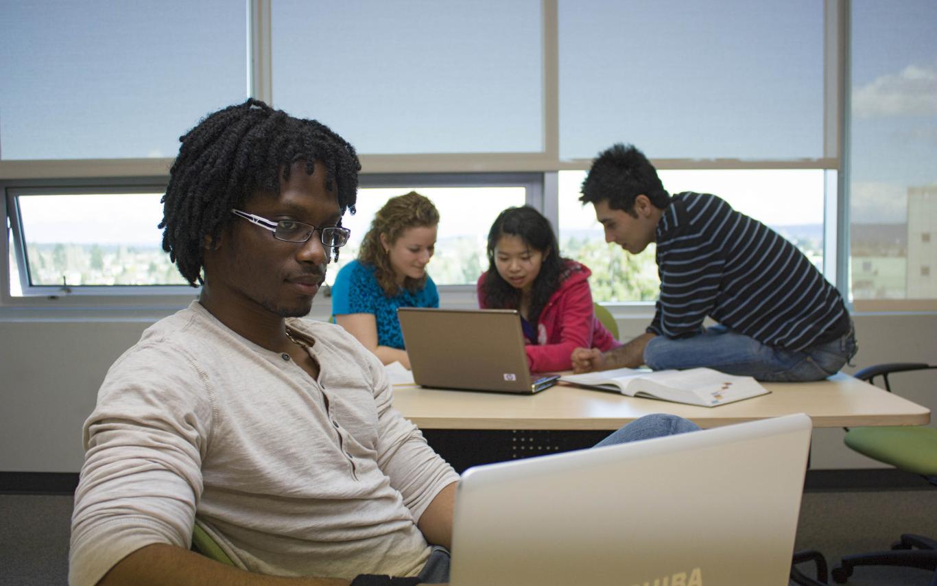 Students discovering the importance of teaching courses online and online education